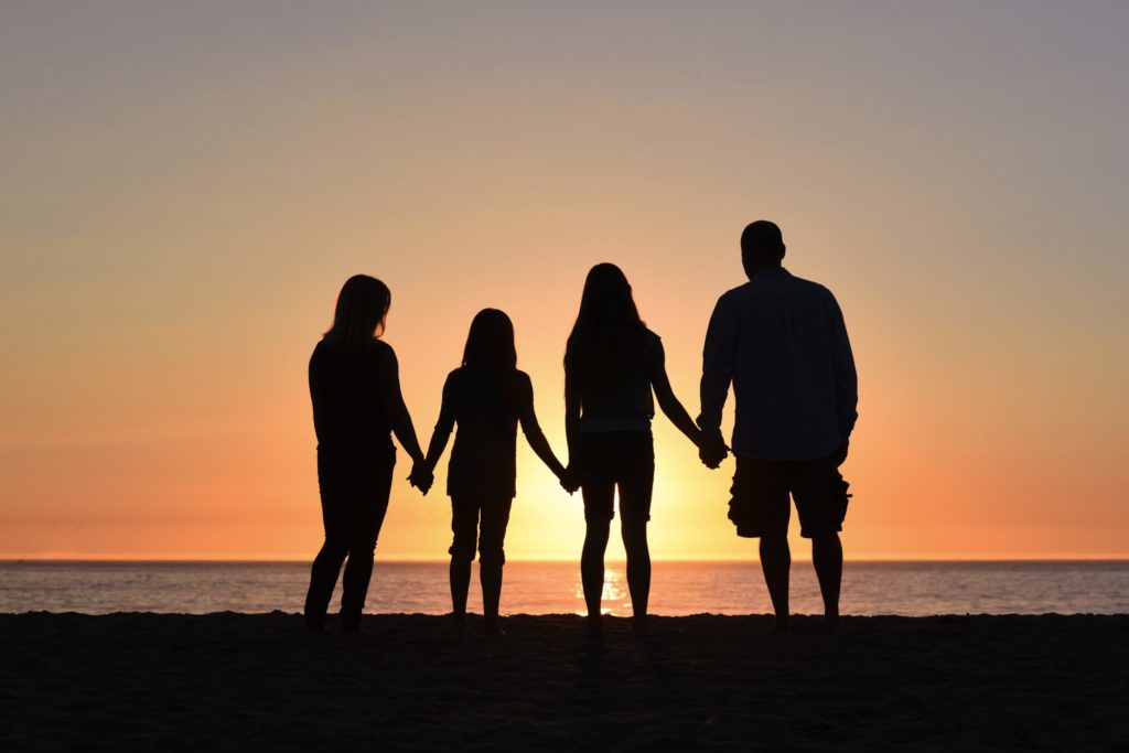Silhouette of Family on the Beach