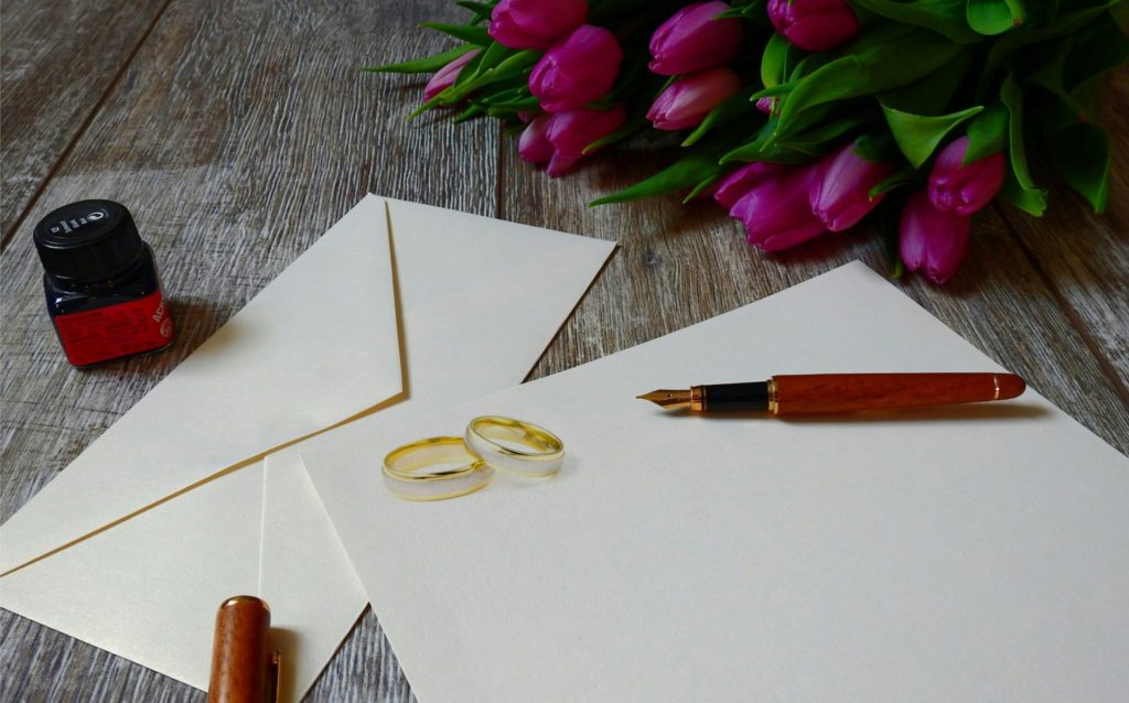 Wedding Card with Flowers on a Table