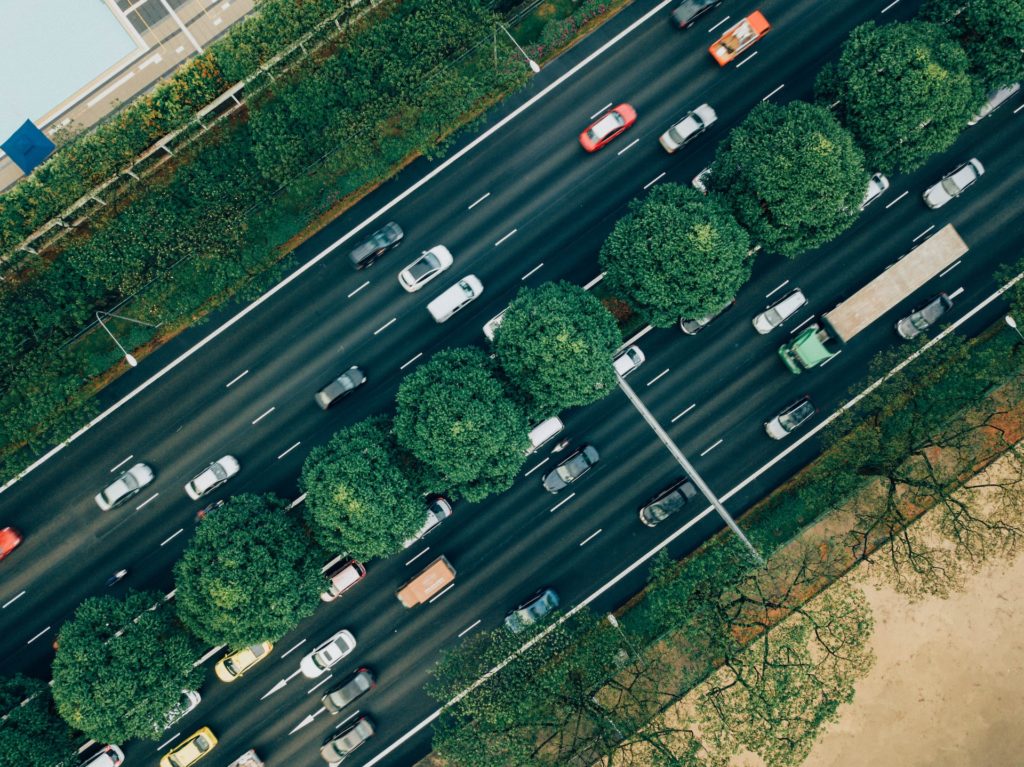 Birdseye view of cars driving on a highway