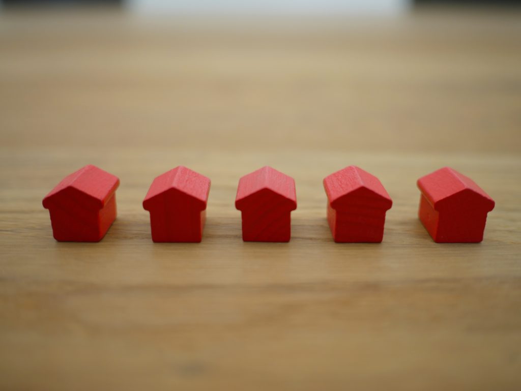 Small red "monopoly" houses